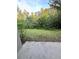 Private backyard with grassy area and a paved patio at 6430 S Goldenrod Rd # 15B, Orlando, FL 32822