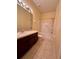 Bathroom with tub shower combo, toilet and vanity at 6430 S Goldenrod Rd # 15B, Orlando, FL 32822