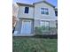 Townhome back view with patio and yard at 6430 S Goldenrod Rd # 15B, Orlando, FL 32822