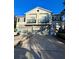 Two-story townhome with attached garages and balconies at 6430 S Goldenrod Rd # 15B, Orlando, FL 32822