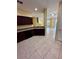 Kitchen view of living room and patio doors at 6430 S Goldenrod Rd # 15B, Orlando, FL 32822