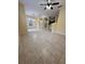 Open living area with tile flooring and access to patio at 6430 S Goldenrod Rd # 15B, Orlando, FL 32822