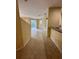 Open living area with tile flooring and access to patio at 6430 S Goldenrod Rd # 15B, Orlando, FL 32822