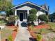 Gray house with a front porch, landscaped yard, and walkway at 1019 W Jefferson St, Orlando, FL 32805