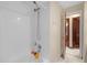 Bathroom with shower/tub combo and access to other rooms at 172 Sheridan Ave, Longwood, FL 32750