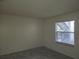 Bright bedroom with tile floors and a window at 2260 Cascades Blvd # 107, Kissimmee, FL 34741