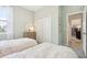 Bedroom with two twin beds and built in closet at 423 Eventide Ave, Mascotte, FL 34753