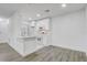 Modern white kitchen with quartz countertops and appliances at 4352 S Kirkman Rd # 1213, Orlando, FL 32811