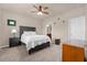 Main bedroom with a comfortable bed, nightstand and ample floor space at 535 Citrus Isle Blvd, Davenport, FL 33837