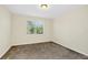 Spacious bedroom with neutral walls and carpet at 8441 Chilton Dr, Orlando, FL 32836