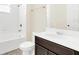 Clean bathroom with white bathtub and vanity at 8441 Chilton Dr, Orlando, FL 32836