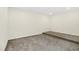 Bonus room with neutral carpeting and step-up at 8441 Chilton Dr, Orlando, FL 32836