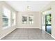 Bright breakfast room with tile flooring and sliding glass doors to patio at 8441 Chilton Dr, Orlando, FL 32836