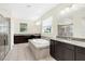 Spa-like bathroom with soaking tub and double vanity at 8441 Chilton Dr, Orlando, FL 32836