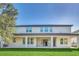 Back of house showing two-story home with patio at 8441 Chilton Dr, Orlando, FL 32836
