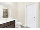 Simple bathroom with toilet and vanity at 8441 Chilton Dr, Orlando, FL 32836