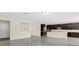 Spacious kitchen featuring dark wood cabinets and an island at 8441 Chilton Dr, Orlando, FL 32836