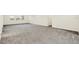 Bright living room with neutral carpeting and large windows at 8441 Chilton Dr, Orlando, FL 32836