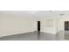Bright and spacious living room with tile flooring and access to other rooms at 8441 Chilton Dr, Orlando, FL 32836