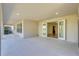 Covered patio with view of the home's interior at 8441 Chilton Dr, Orlando, FL 32836