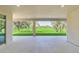Covered patio overlooking a grassy backyard at 8441 Chilton Dr, Orlando, FL 32836