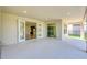 Covered patio with French doors opening to the interior at 8441 Chilton Dr, Orlando, FL 32836
