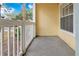 Private porch with white railing overlooking the community at 1037 S Hiawassee Rd # 2815, Orlando, FL 32835
