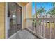 Covered porch with sliding glass door access to the interior at 1037 S Hiawassee Rd # 2815, Orlando, FL 32835