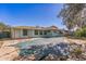 Backyard view showcasing pool and shed at 1716 Sprucewood Ln, Orlando, FL 32818