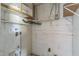 Laundry room with shelving and white block walls at 1716 Sprucewood Ln, Orlando, FL 32818
