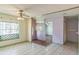 View of the living room, entryway and kitchen at 1716 Sprucewood Ln, Orlando, FL 32818