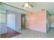 Shows the open concept of the living room and hallway at 1716 Sprucewood Ln, Orlando, FL 32818