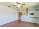 Living room with tile flooring and a view into the kitchen at 1716 Sprucewood Ln, Orlando, FL 32818