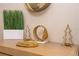 Stylish gold accents and decor on a wooden console table at 172 Villa Domani Cir, Davenport, FL 33896