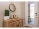 Entryway with a modern console table and mirror at 172 Villa Domani Cir, Davenport, FL 33896