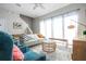 Cozy living room featuring a comfortable sofa and stylish decor at 172 Villa Domani Cir, Davenport, FL 33896