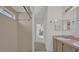 Bathroom with double sinks and shower, view to backyard at 2238 Wyndam Way, Kissimmee, FL 34743