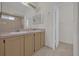 Bathroom with double sinks and a separate shower at 2238 Wyndam Way, Kissimmee, FL 34743