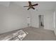 Spacious bedroom with access to another room and bathroom at 2238 Wyndam Way, Kissimmee, FL 34743