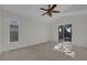 Bedroom with sliding door leading to the backyard pool at 2238 Wyndam Way, Kissimmee, FL 34743