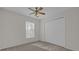Bright bedroom with ceiling fan and double door closet at 2238 Wyndam Way, Kissimmee, FL 34743