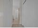 Hallway with doors to bedrooms and bathroom at 2238 Wyndam Way, Kissimmee, FL 34743
