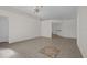 Spacious living room with tile floors and decorative inlay at 2238 Wyndam Way, Kissimmee, FL 34743