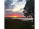 Stunning sunset view over the lake at 2555 Gabriel Rd, Fort Meade, FL 33841