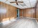 Bonus room with wood paneling and ceiling fan at 3607 Datura Ct, Winter Park, FL 32792