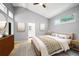 Spacious bedroom with ensuite bathroom and high ceilings at 3991 Campfire Way, Casselberry, FL 32707