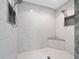 Large walk-in shower with double shower heads and bench at 4851 Foxrun Cir, Lakeland, FL 33813