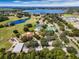 Community overview showing clubhouse, pool, and tennis courts at 8019 Arcadian Ct, Mount Dora, FL 32757