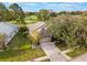 Aerial view of a house on a golf course at 8019 Arcadian Ct, Mount Dora, FL 32757