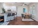 Kitchen with a breakfast bar and a dining table for six at 8019 Arcadian Ct, Mount Dora, FL 32757